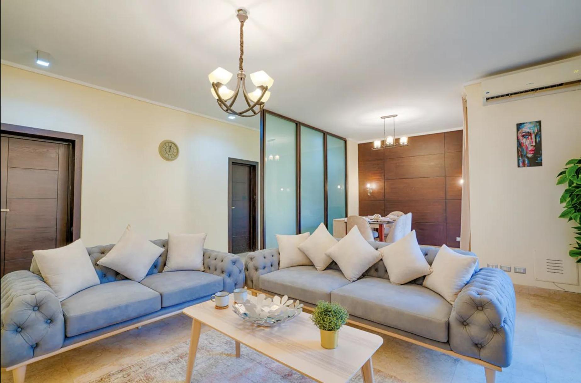 The Suites Near Auc By Elegant Cairo Exterior photo